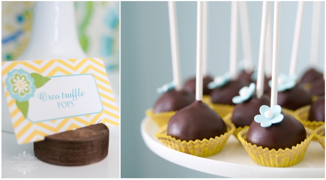 Chocolate covered Oreo Cake Pops with blue flower