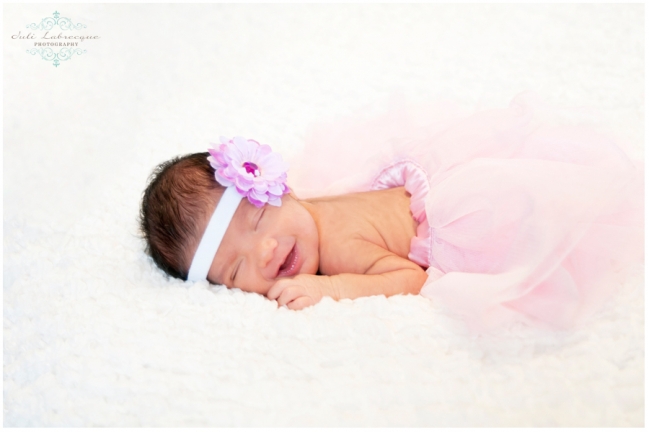 newborn girl in pink tutu